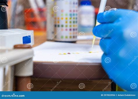 dropping urine strip test with pipette|how to use urine dip test.